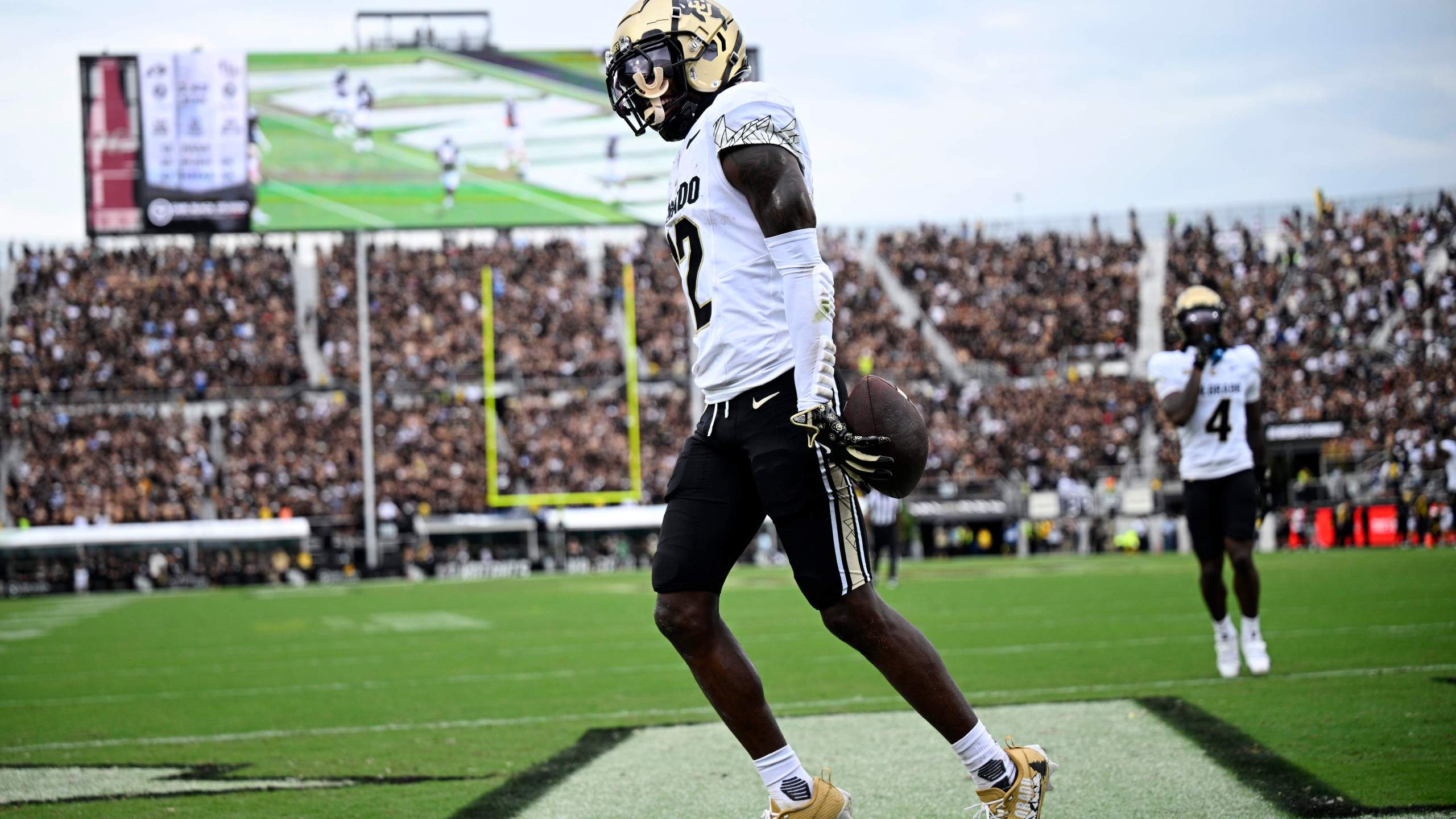 FILE - Colorado wide receiver Travis Hunter (12) celebrates his touchdown catch during the first half of an NCAA college football game against Central Florida, Saturday, Sept. 28, 2024, in Orlando, Fla. (AP Photo/Phelan M. Ebenhack, File)