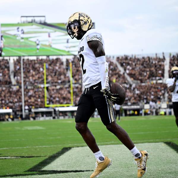 FILE - Colorado wide receiver Travis Hunter (12) celebrates his touchdown catch during the first half of an NCAA college football game against Central Florida, Saturday, Sept. 28, 2024, in Orlando, Fla. (AP Photo/Phelan M. Ebenhack, File)