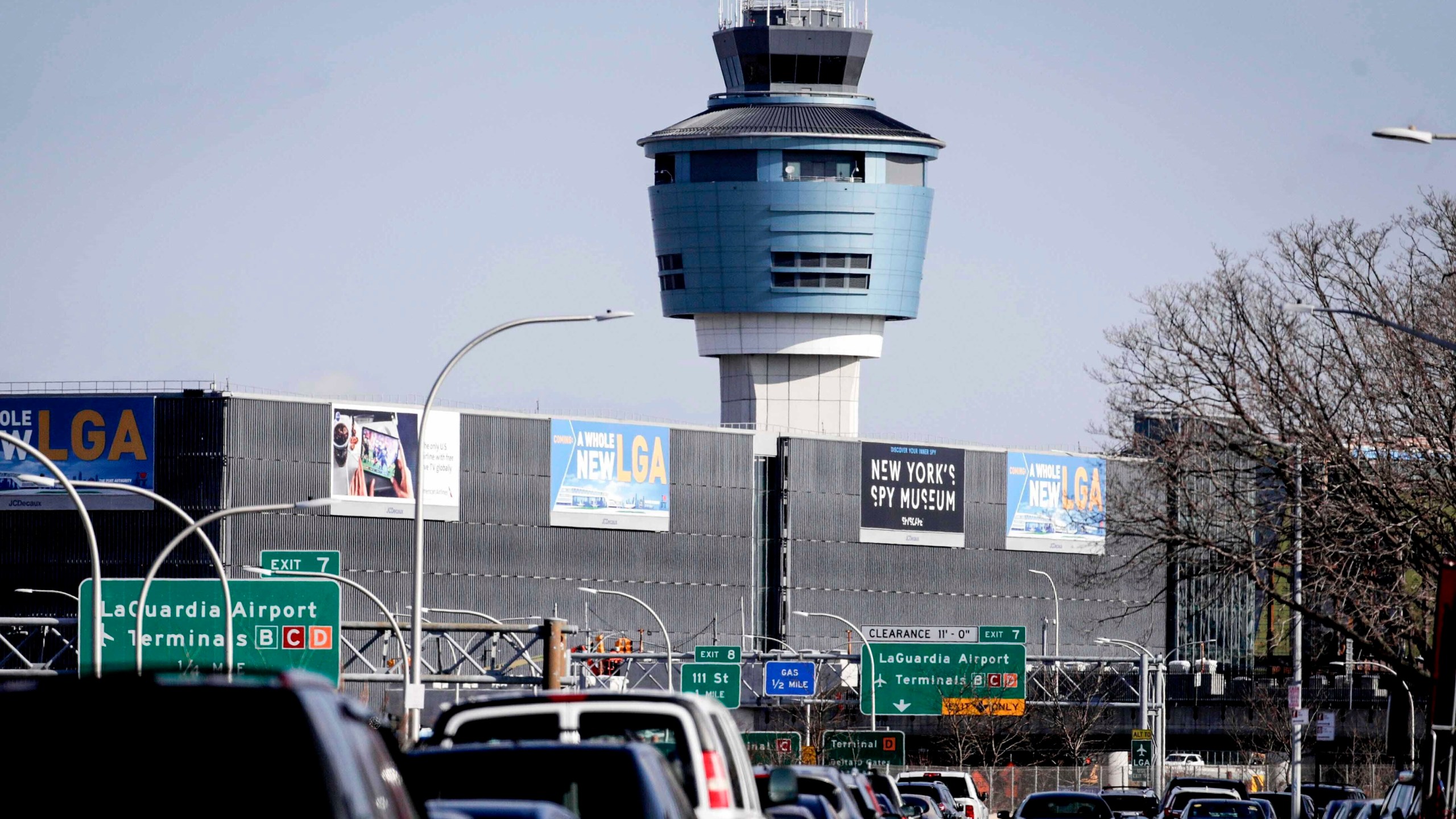 FILE - In this Friday Jan. 25, 2019, file photo is the air traffic control tower at LaGuardia Airport in New York. (AP Photo/Julio Cortez, File)