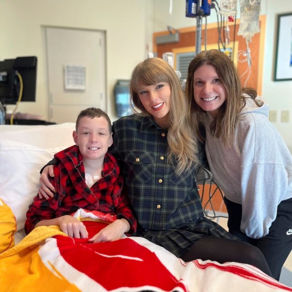 In this image provided by Cassie Thomas, Beckett Thomas, 13, who is a patient at Children's Mercy Hospital in Kansas City, Mo., and his mother Cassie Thomas, right, pose with Taylor Swift, Thursday, Dec. 12, 2024. (Cassie Thomas via AP)