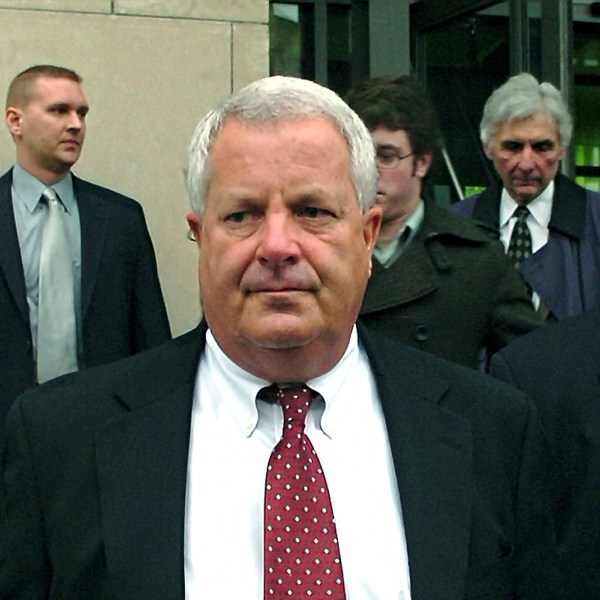 FILE - In this Feb. 12, 2009, file photo, Michael Conahan, center, a former Pennsylvania judge involved in a scheme to send youths to a for-profit jail in exchange for kickbacks, leaves the federal courthouse in Scranton, Pa. (AP Photo/David Kidwell, File)