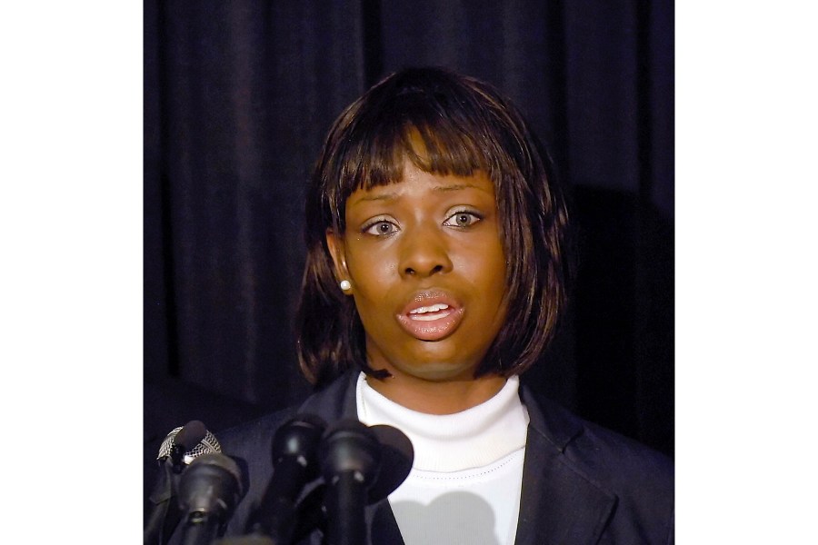 FILE - Crystal Mangum, who falsely accused Duke lacrosse players of rape, addresses the media during a news conference in Durham, N.C., on Oct. 23, 2008. (AP Photo/Sara D. Davis, File)