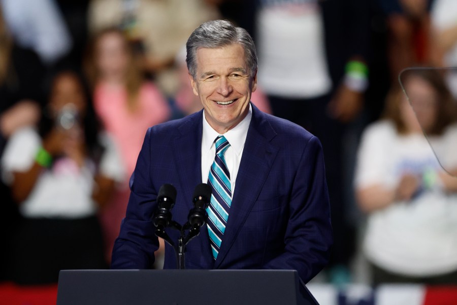 FILE - North Carolina Gov. Roy Cooper speaks at a campaign event for Democratic presidential nominee Vice President Kamala Harris in Charlotte, N.C., Thursday, Sept. 12, 2024. (AP Photo/Nell Redmond, File)