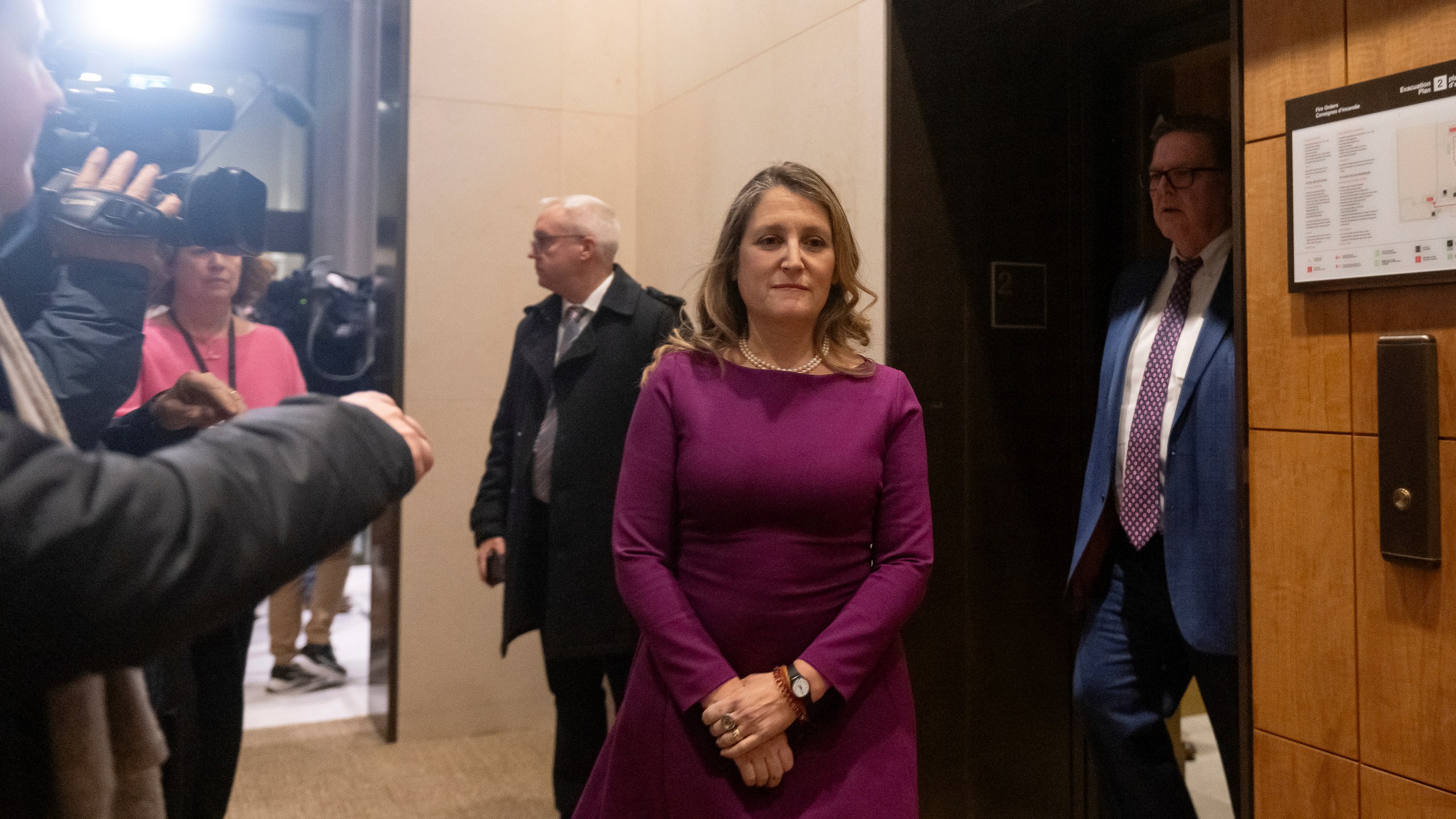 Chrystia Freeland, who today stepped down as finance minister and deputy prime minister, arrives for a national caucus meeting, in Ottawa, Ontario, Monday, Dec. 16, 2024. (Spencer Colby/The Canadian Press via AP)