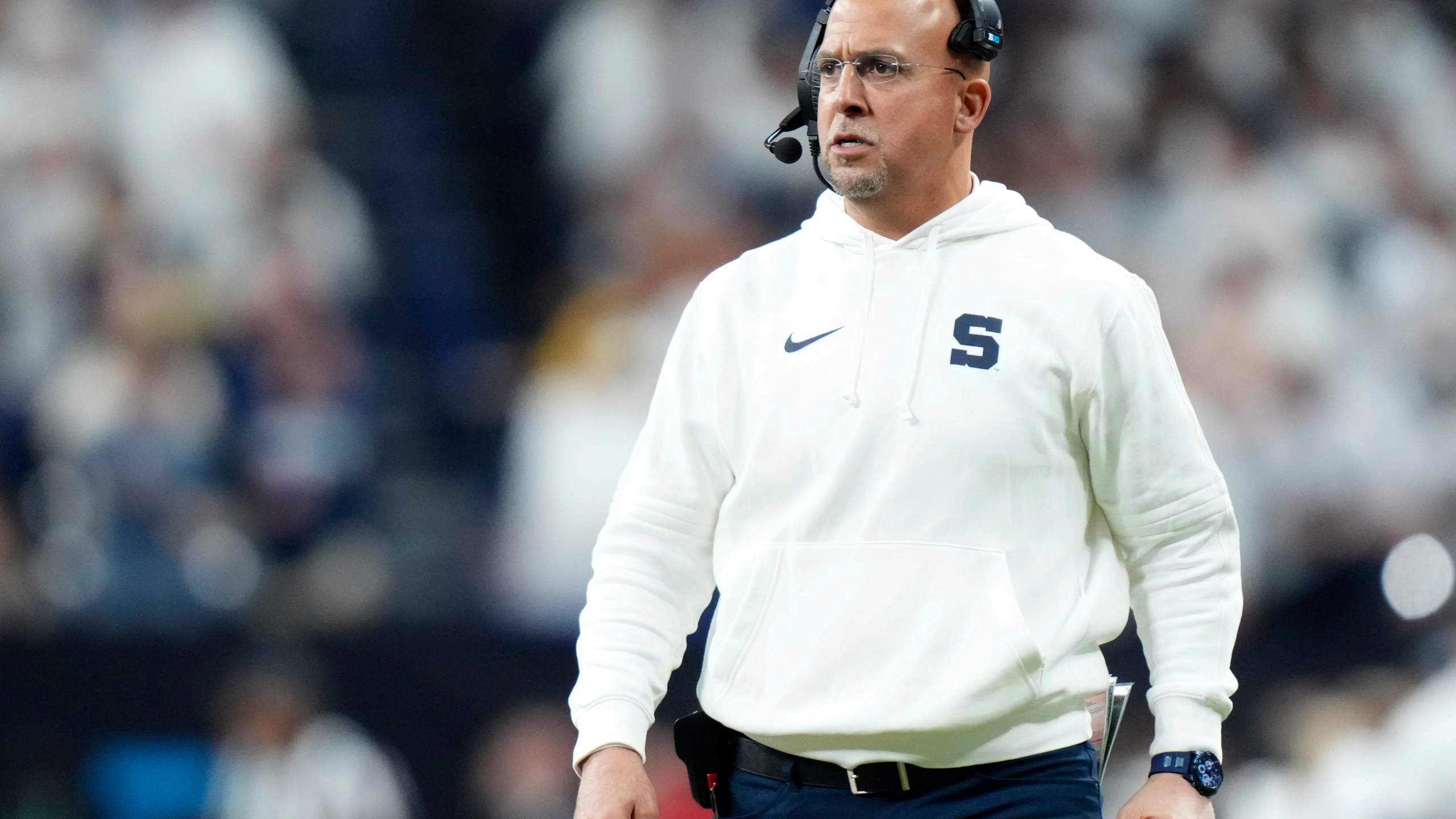 Penn State head coach James Franklin watches from the sideline during the first half of the Big Ten championship NCAA college football game against Oregon, Saturday, Dec. 7, 2024, in Indianapolis. (AP Photo/AJ Mast)