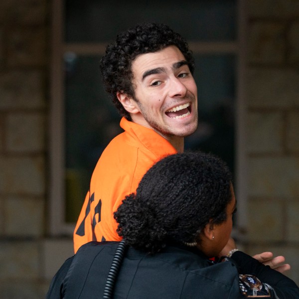 Suspect Luigi Mangione is taken into the Blair County Courthouse on Tuesday, Dec. 10, 2024, in Hollidaysburg, Pa. (Benjamin B. Braun/Pittsburgh Post-Gazette via AP)