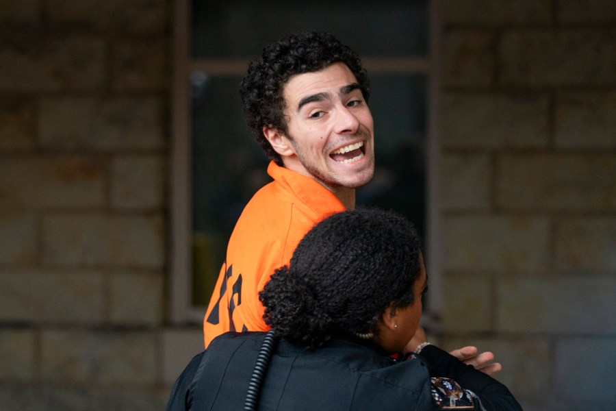 Suspect Luigi Mangione is taken into the Blair County Courthouse on Tuesday, Dec. 10, 2024, in Hollidaysburg, Pa. (Benjamin B. Braun/Pittsburgh Post-Gazette via AP)