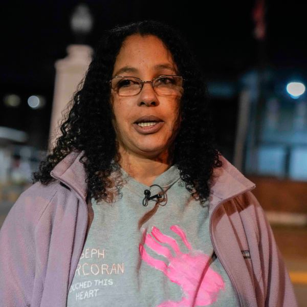 Calling herself his wife, Tahina Corcoran speaks outside of Indiana State Prison on Tuesday, Dec. 17, 2024, in Michigan City, Ind., where, barring last-minute court action or intervention by Gov. Eric Holcomb, Joseph Corcoran, 49, convicted in the 1997 killings of his brother and three other people, is scheduled to be put to death by lethal injection before sunrise Wednesday, Dec. 18. (AP Photo/Erin Hooley)