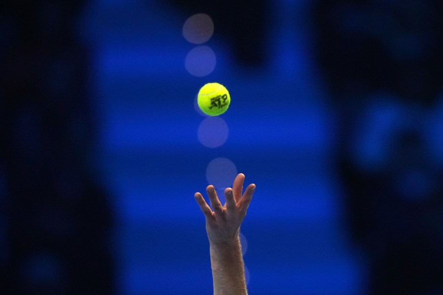 FILE- Italy's Jannik Sinner serves the ball to Russia's Daniil Medvedev during their singles tennis match of the ATP World Tour Finals at the Inalpi Arena, in Turin, Italy, Thursday, Nov. 14, 2024. (AP Photo/Antonio Calanni, File)