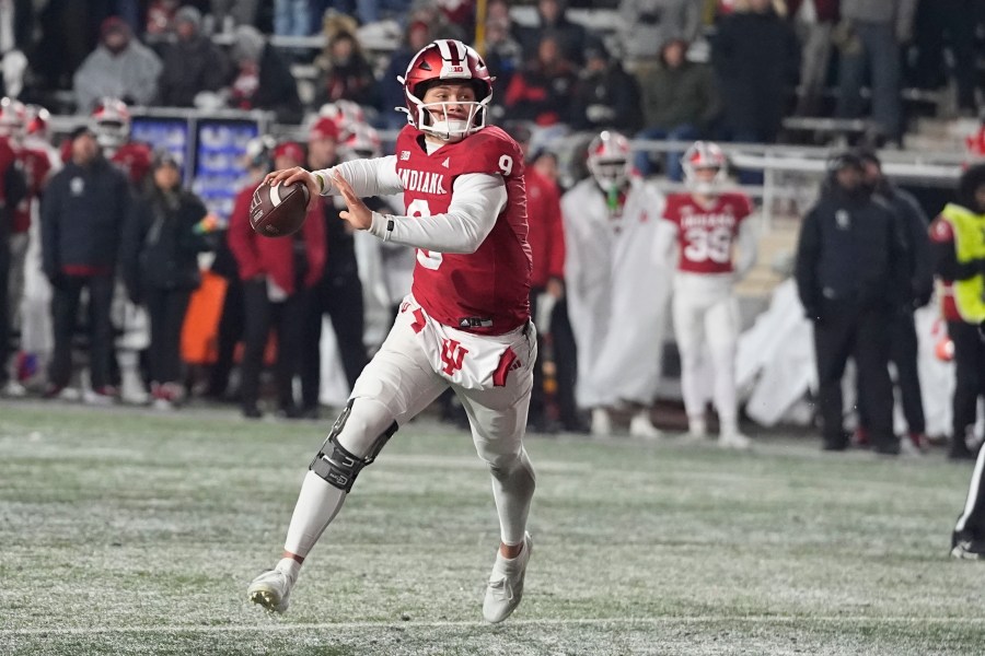 Indiana quarterback Kurtis Rourke looks to throw during the second half of an NCAA college football game against Purdue, Saturday, Nov. 30, 2024, in Bloomington, Ind. (AP Photo/Darron Cummings)