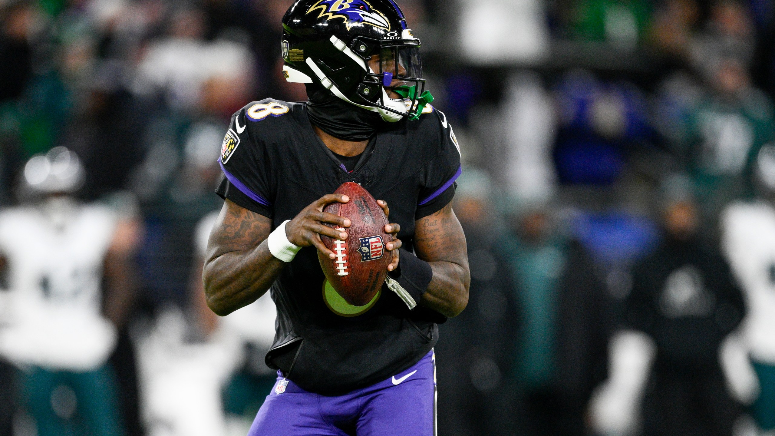 Baltimore Ravens quarterback Lamar Jackson looks to pass against the Philadelphia Eagles during the first half of an NFL football game, Sunday, Dec. 1, 2024, in Baltimore. (AP Photo/Nick Wass)