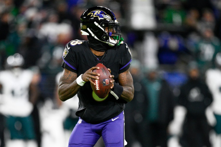 Baltimore Ravens quarterback Lamar Jackson looks to pass against the Philadelphia Eagles during the first half of an NFL football game, Sunday, Dec. 1, 2024, in Baltimore. (AP Photo/Nick Wass)