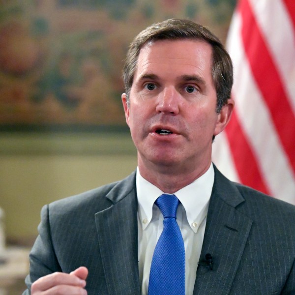 Kentucky Gov. Andy Beshear talks about the gains in the economic growth f the state during the past year in Frankfort, Ky., Wednesday, Dec. 18, 2024. (AP Photo/Timothy D. Easley)