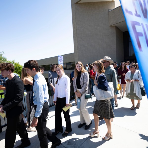 FILE - Youth plaintiffs in the Held v. Montana climate case leave the Montana Supreme Court, on July 10, 2024, in Helena, Mont. (Thom Bridge/Independent Record via AP, File)