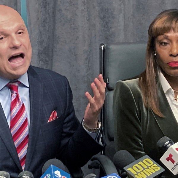 Ingrid Lewis-Martin, who abruptly resigned Sunday as New York Mayor Eric Adams' chief adviser, and her attorney Arthur Aidala, spoke during a news conference, in New York, Monday, Dec. 16, 2024. (AP Photo/Jake Offenhartz)