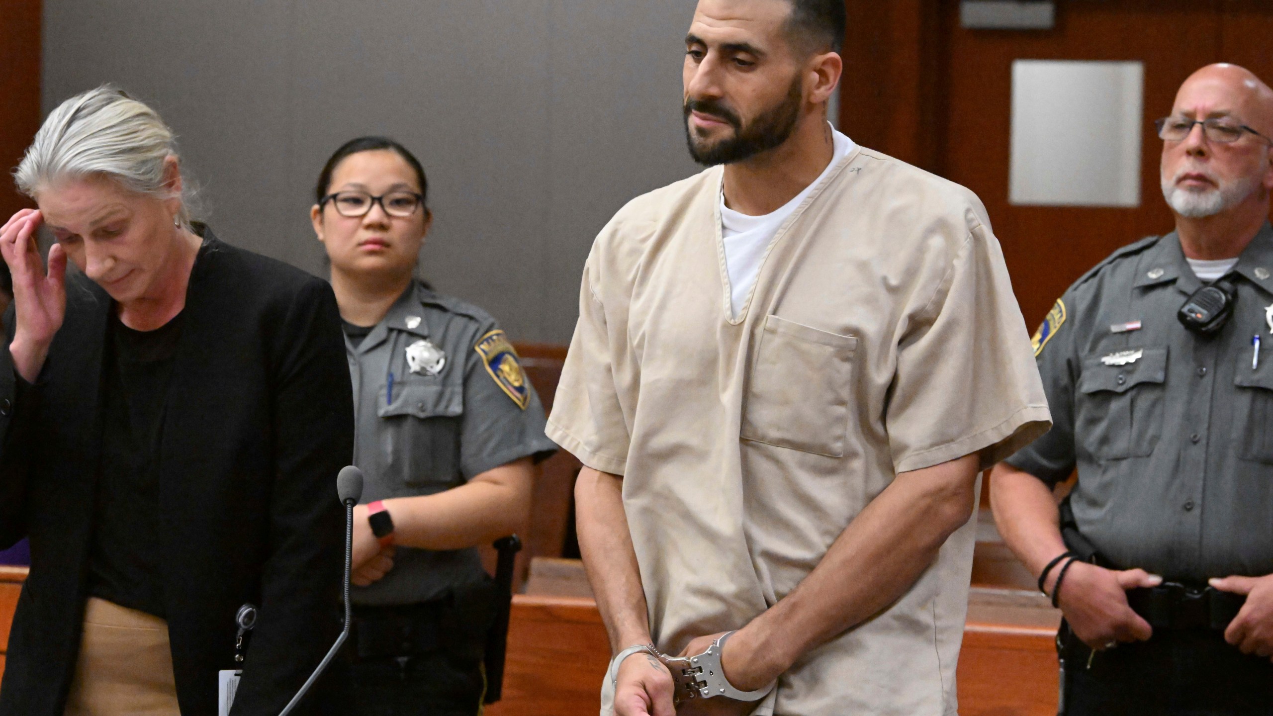 FILE - Dennis Hernandez, the troubled brother of the late New England Patriots tight end Aaron Hernandez, stands with his public defender Sandra Crowell during his arraignment, Aug. 1, 2023, at Connecticut Superior Court in New Britain, Conn. (Douglas Healey/New York Post via AP, Pool, File)