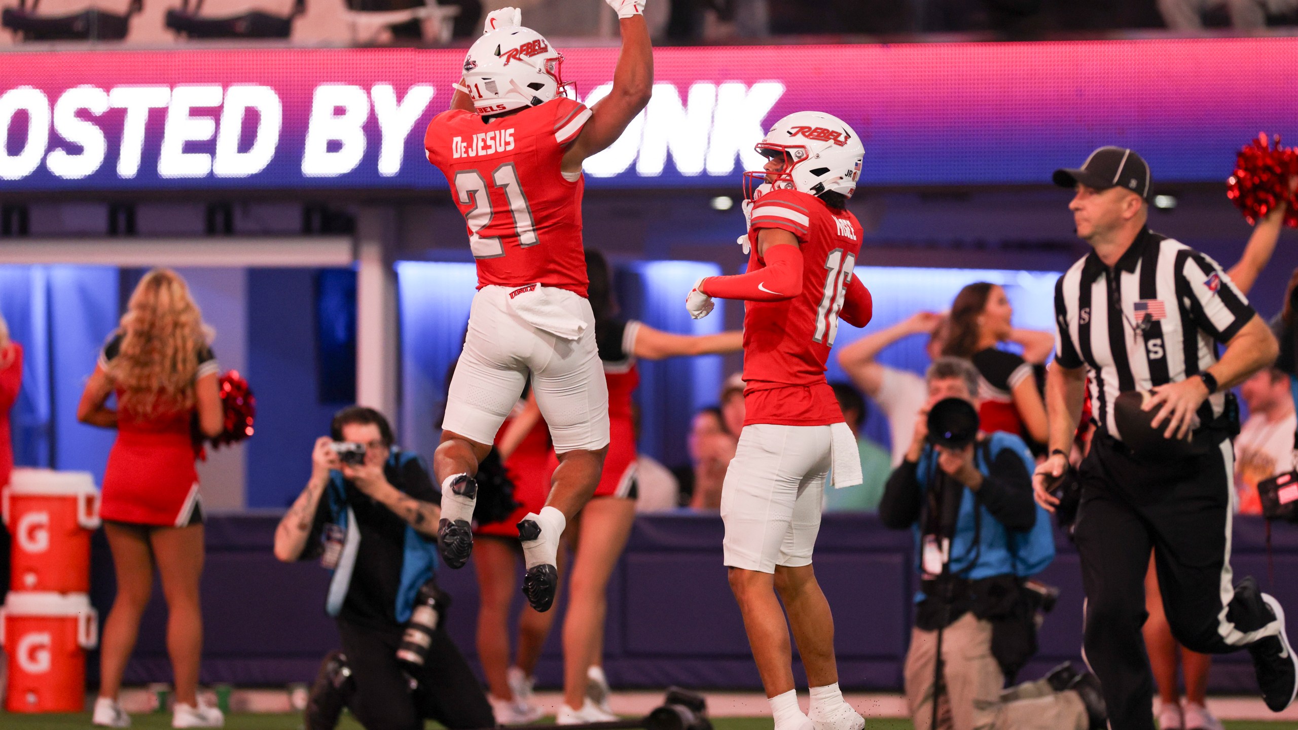 UNLV wide receiver Kayden McGee, right, celebrates his touchdown with wide receiver Jacob De Jesus during the first half of the LA Bowl NCAA college football game against California Wednesday, Dec. 18, 2024, in Inglewood, Calif. (AP Photo/Ryan Sun)