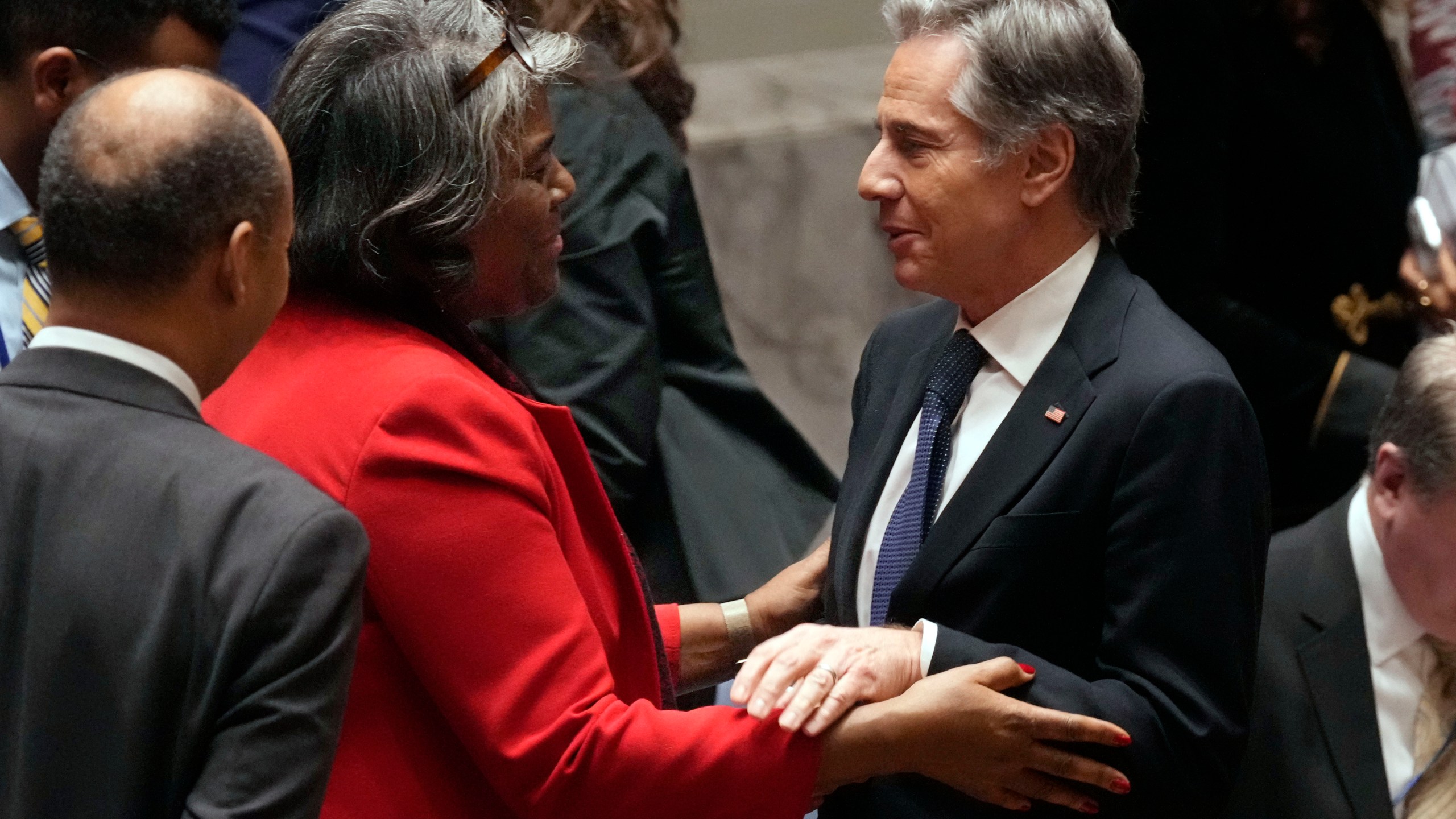 U.S. UN Ambassador Linda Thomas-Greenfield talks with US Secretary of State Antony Blinken after a meeting in the United Nations Security Council, Thursday, Dec. 19, 2024. (AP Photo/Richard Drew)