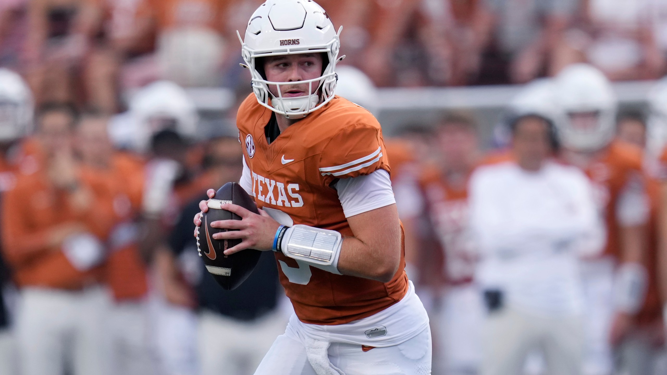 FILE - Texas quarterback Quinn Ewers (3) looks to pass against UTSA during the first half of an NCAA college football game in Austin, Texas, Saturday, Sept. 14, 2024. (AP Photo/Eric Gay, File)