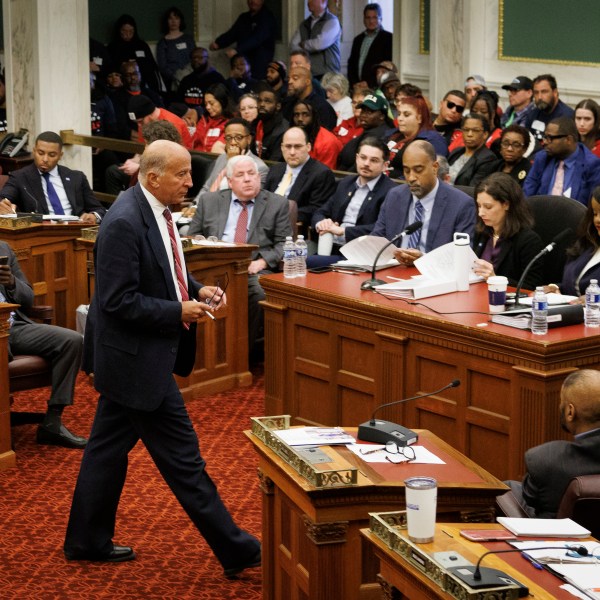 FILE - City Councilman Mark Squilla walks across the chambers at the start of a public hearing on the construction of a new arena for the NBA basketball team Philadelphia 76ers, Nov. 12, 2024, in Philadelphia. (Alejandro A. Alvarez/The Philadelphia Inquirer via AP, File)