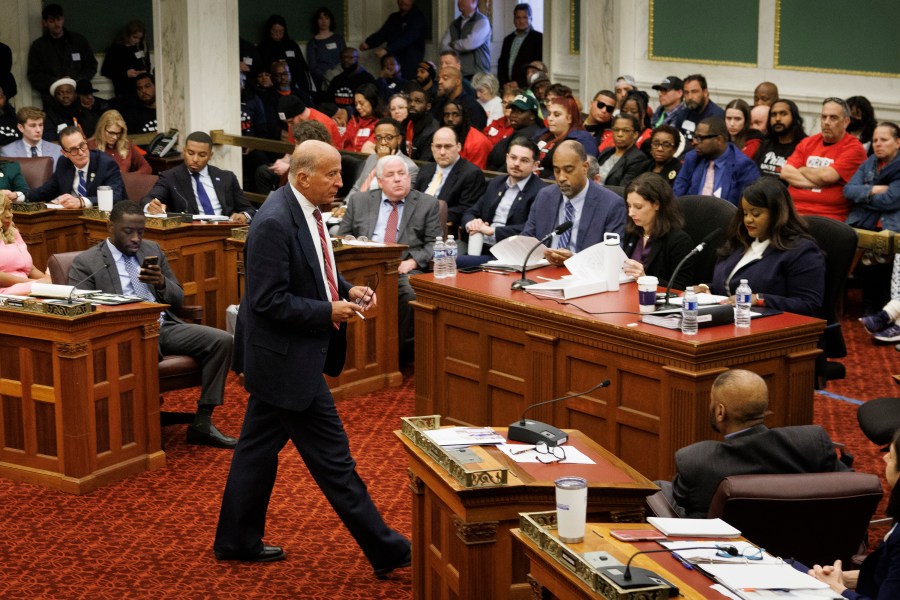 FILE - City Councilman Mark Squilla walks across the chambers at the start of a public hearing on the construction of a new arena for the NBA basketball team Philadelphia 76ers, Nov. 12, 2024, in Philadelphia. (Alejandro A. Alvarez/The Philadelphia Inquirer via AP, File)