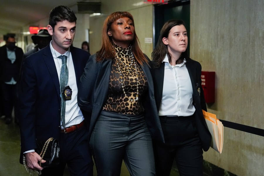 Ingrid Lewis-Martin is escorted into Manhattan criminal court, Thursday, Dec. 19, 2024, in New York. (AP Photo/Julia Demaree Nikhinson)