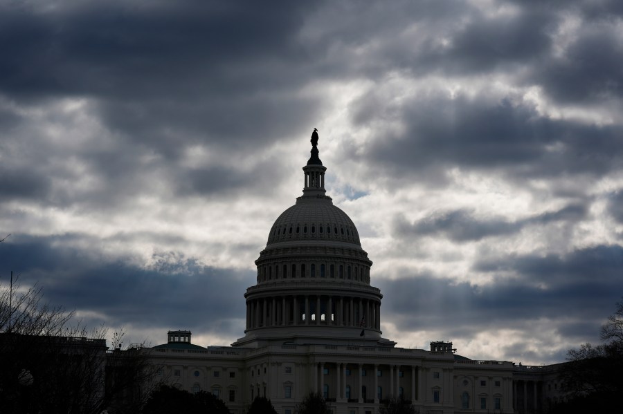 FILE - The Capitol in Washington, is framed by early morning clouds, March 19, 2024. Congress has until midnight Friday to come up with a way to fund the government, or federal agencies will shutter. It's up to each federal agency to determine how it handles a shutdown, but there would be disruptions in many services. (AP Photo/J. Scott Applewhite, File)