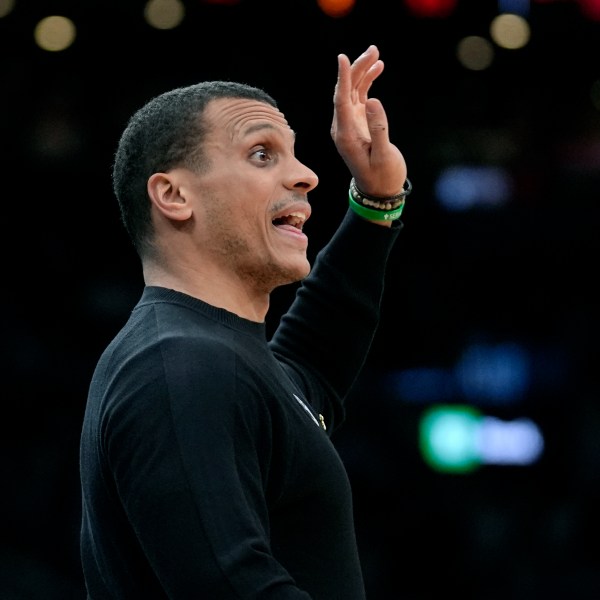 Boston Celtics head coach Joe Mazzulla shouts to his players in the first half of an NBA basketball game against the Chicago Bulls, Thursday, Dec. 19, 2024, in Boston. (AP Photo/Steven Senne)