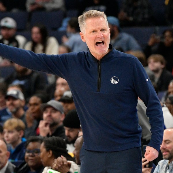 Golden State Warriors head coach Steve Kerr reacts to a referee's call in the first half of an NBA basketball game against the Memphis Grizzlies Thursday, Dec. 19, 2024, in Memphis, Tenn. (AP Photo/Brandon Dill)