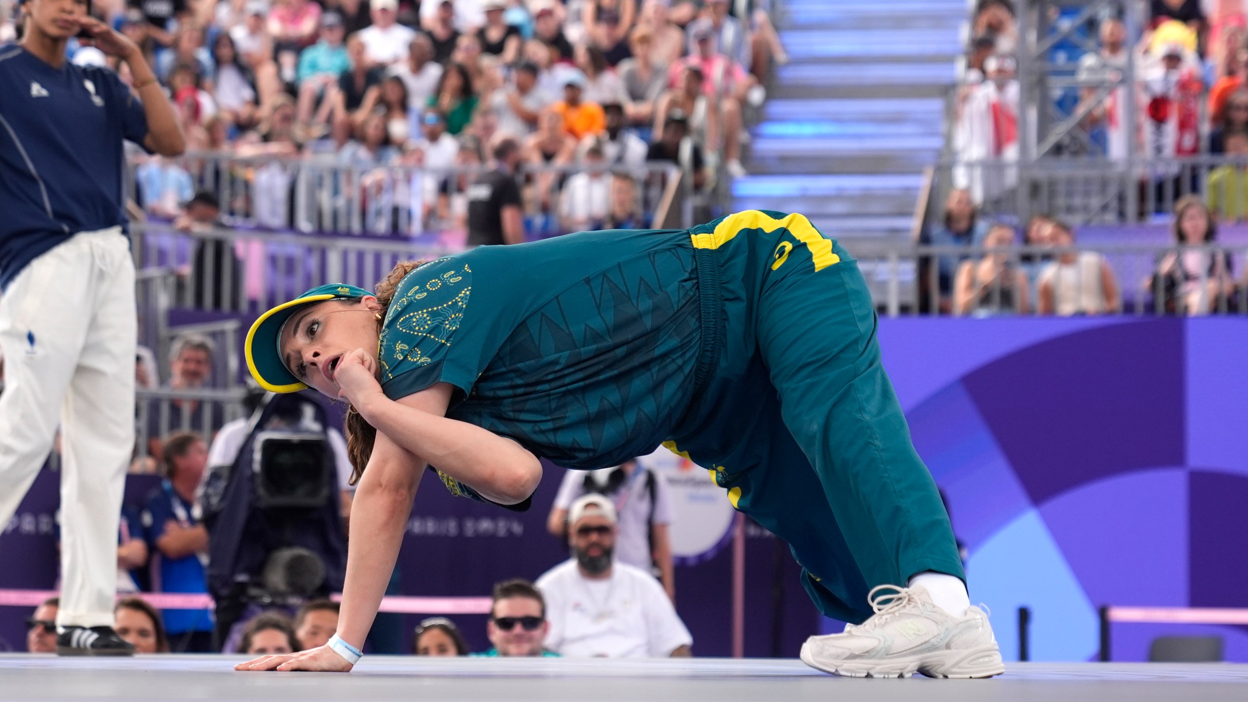 FILE - Australia's Rachael Gunn, known as B-Girl Raygun, competes during the Round Robin Battle at the breaking competition at La Concorde Urban Park at the 2024 Summer Olympics, Friday, Aug. 9, 2024, in Paris, France. (AP Photo/Frank Franklin, File)