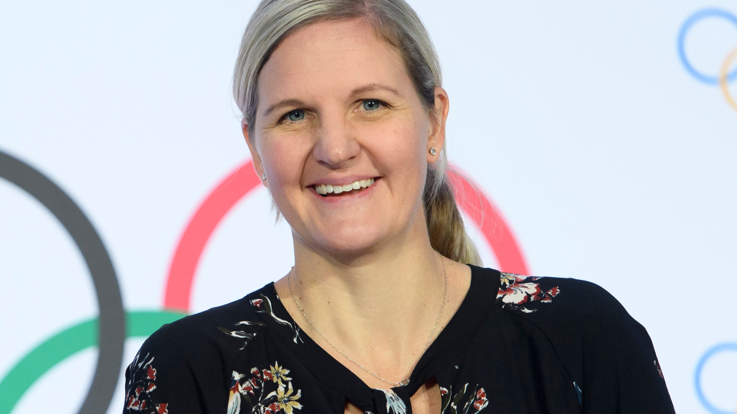 FILE - IOC member and former swimmer Kirsty Coventry smiles on the arrival for a press conference after the executive board meeting of the IOC, at the Olympic House, in Lausanne, Switzerland, Thursday, Jan. 9, 2020. (Laurent Gillieron/Keystone via AP, File)