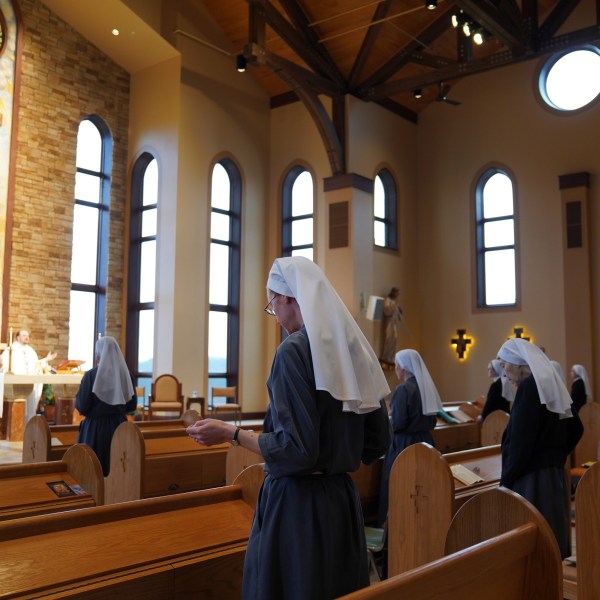 The Franciscan Sisters, T.O.R. of Penance of the Sorrowful Mother stand during Mass in Toronto, Ohio, Thursday, Nov. 7, 2024. (AP Photo/Jessie Wardarski)