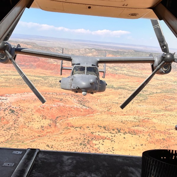 FILE - Two Air Force Special Operations Command CV-22B Ospreys fly low and fast in formation on a training range named the Hornet at Cannon Air Force Base, N.M., Oct. 9, 2024. (AP Photo/Tara Copp, File)