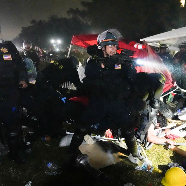 FILE - Police advance on pro-Palestinian demonstrators after defying orders to leave at an encampment on the UCLA campus, in Los Angeles, May 2, 2024. (AP Photo/Jae C. Hong, File)