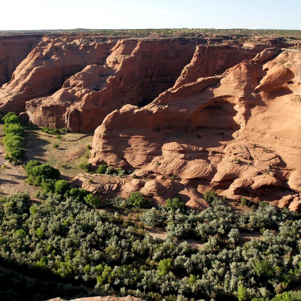 FILE - The vast landscape opens up inside Canyon de Chelly National Monument, May 30, 2010, near Chinle, Ariz. (AP Photo/Ross D. Franklin, File)