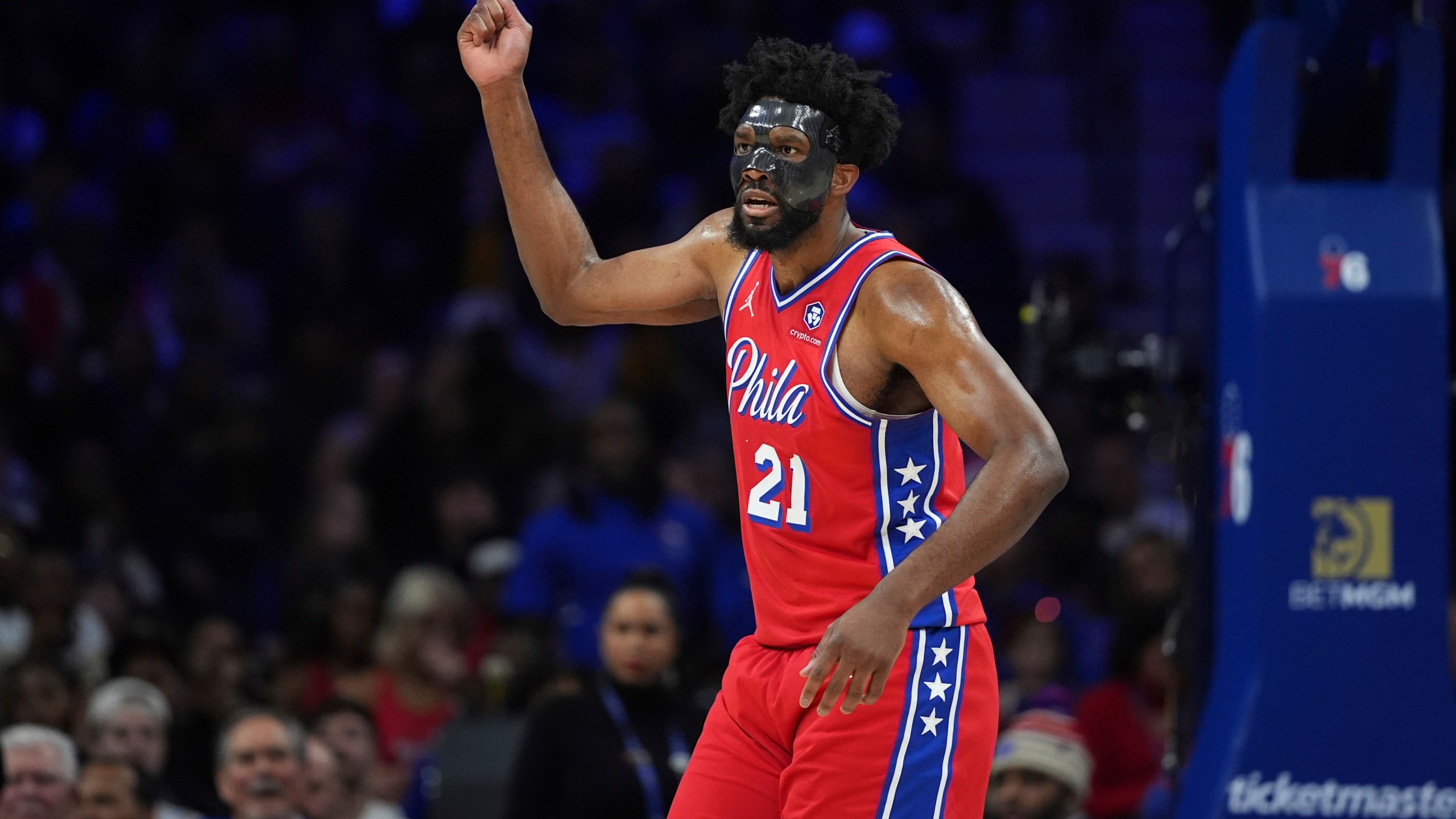 Philadelphia 76ers' Joel Embiid reacts after being fouled during the first half of an NBA basketball game against the Charlotte Hornets, Friday, Dec. 20, 2024, in Philadelphia. (AP Photo/Matt Slocum)