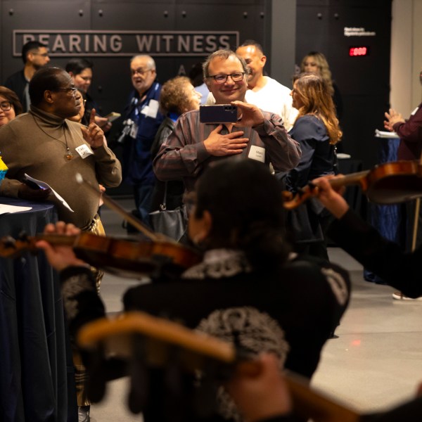 Guests enjoy a performance by Mariachi Palmeros during a Chicanukah event at Holocaust Museum Houston on Thursday, Dec. 19, 2024, in Houston. (AP Photo/Annie Mulligan)