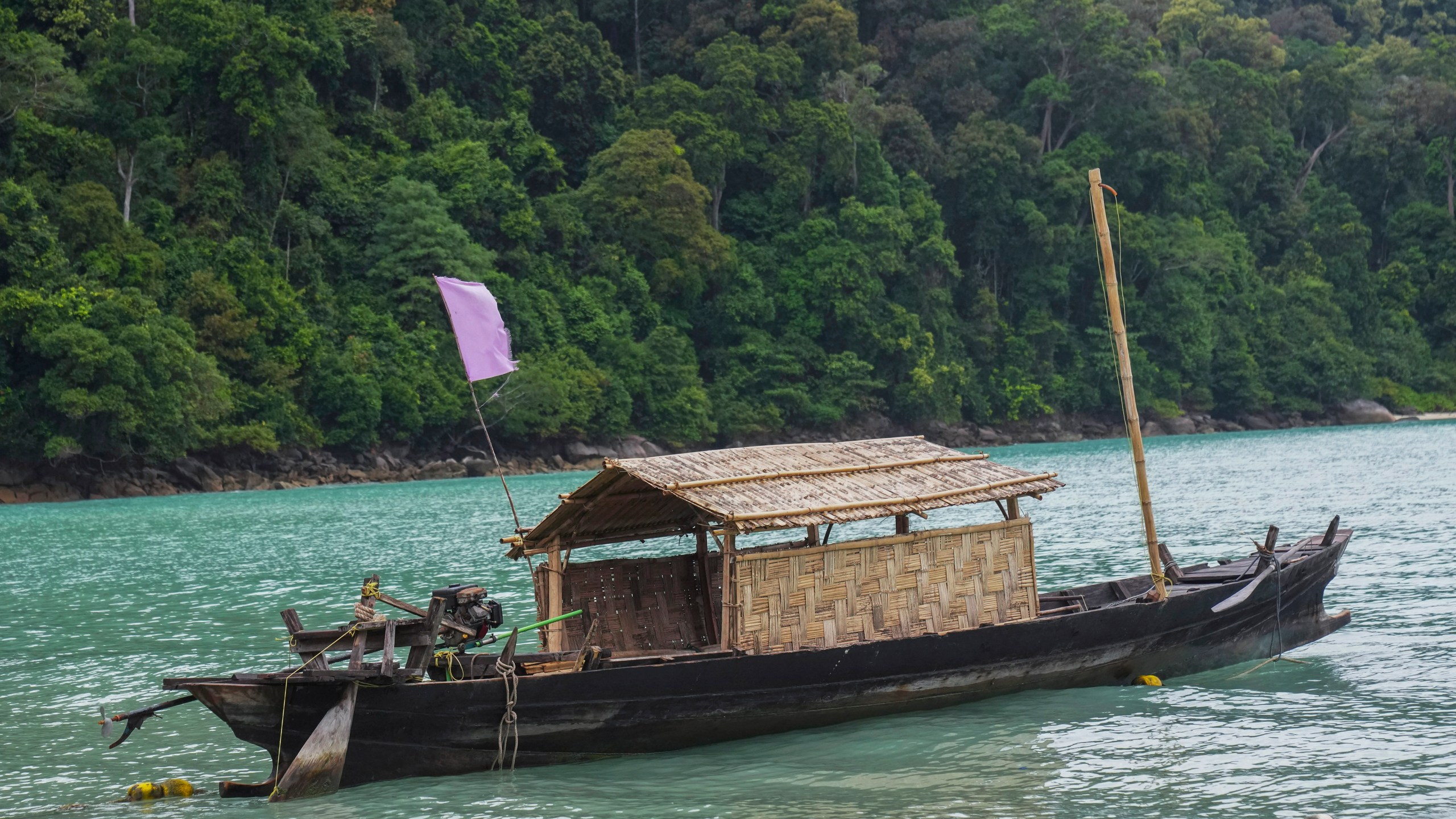 A Kabang boat is docked on Surin Islands, Phang Nga Province, Thailand, Thursday, Dec. 12, 2024. (AP Photo/Sakchai Lalit)