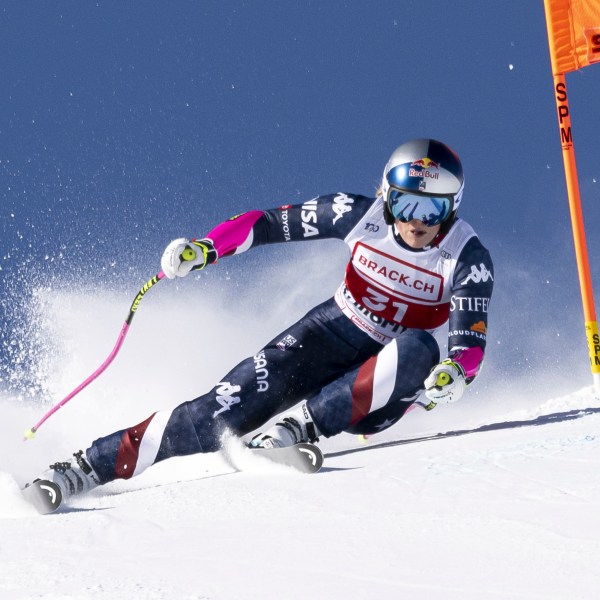 United States' Lindsey Vonn competes in an alpine ski, women's World Cup super G, in St. Moritz, Switzerland, Saturday, Dec. 21, 2024. (Jean-Christophe Bott/Keystone via AP)