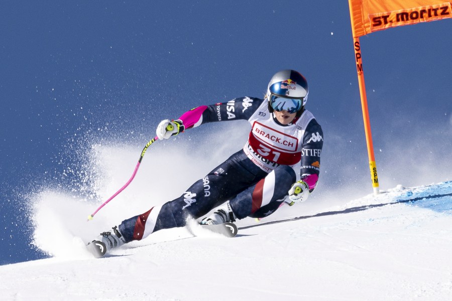 United States' Lindsey Vonn competes in an alpine ski, women's World Cup super G, in St. Moritz, Switzerland, Saturday, Dec. 21, 2024. (Jean-Christophe Bott/Keystone via AP)