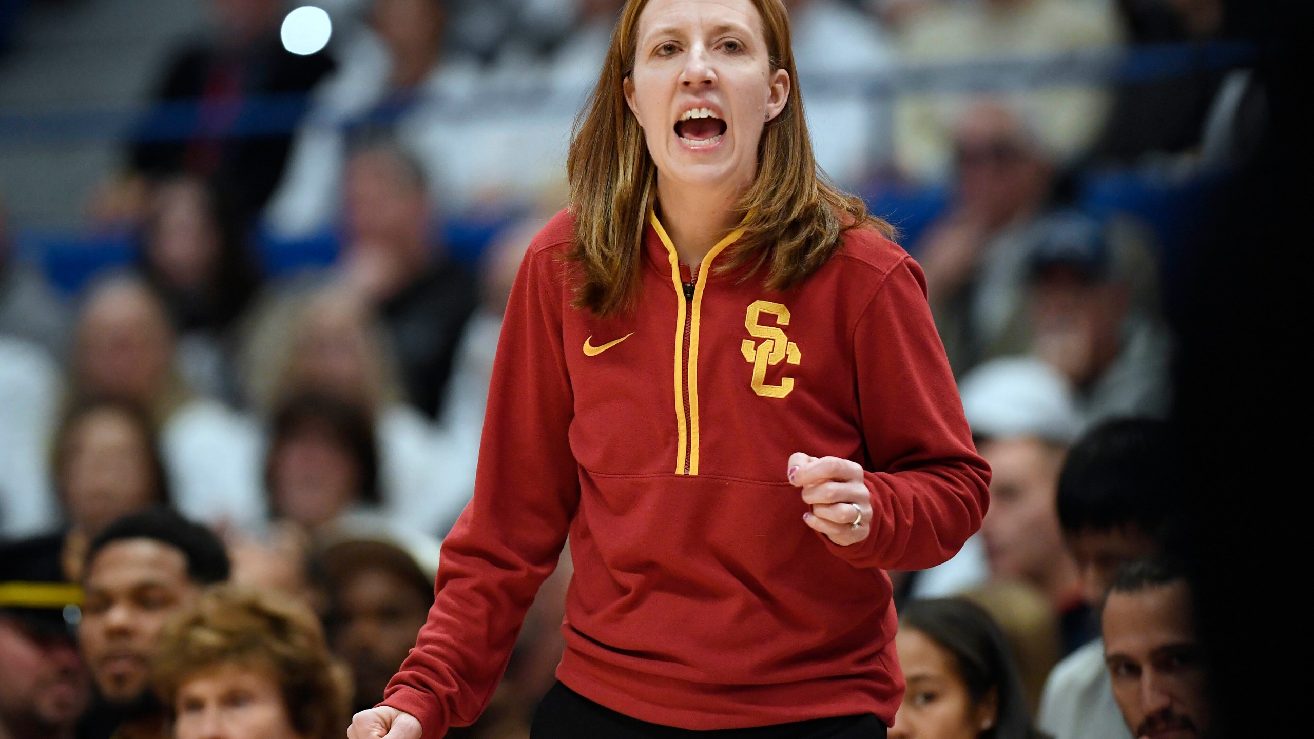 Southern California head coach Lindsay Gottlieb calls to her team in the first half of an NCAA college basketball game against UConn, Saturday, Dec. 21, 2024, in Hartford, Conn. (AP Photo/Jessica Hill)