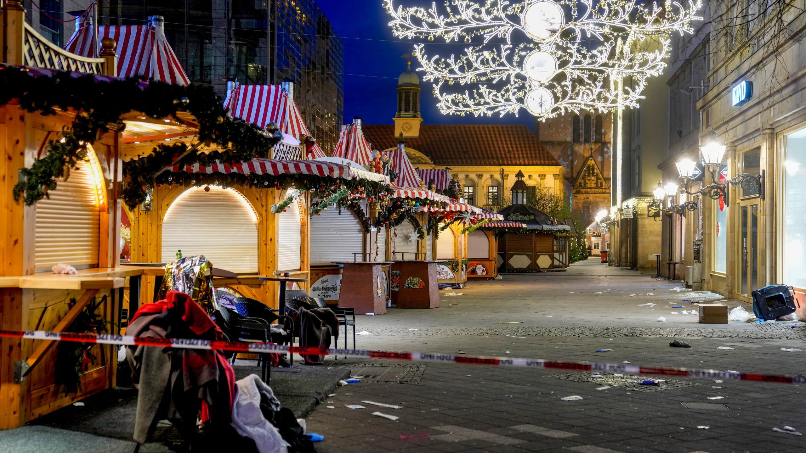 The Christmas market, where a car drove into a crowd on Friday evening, in Magdeburg, Germany, is empty on Saturday evening , Dec. 21, 2024. (AP Photo/Michael Probst)