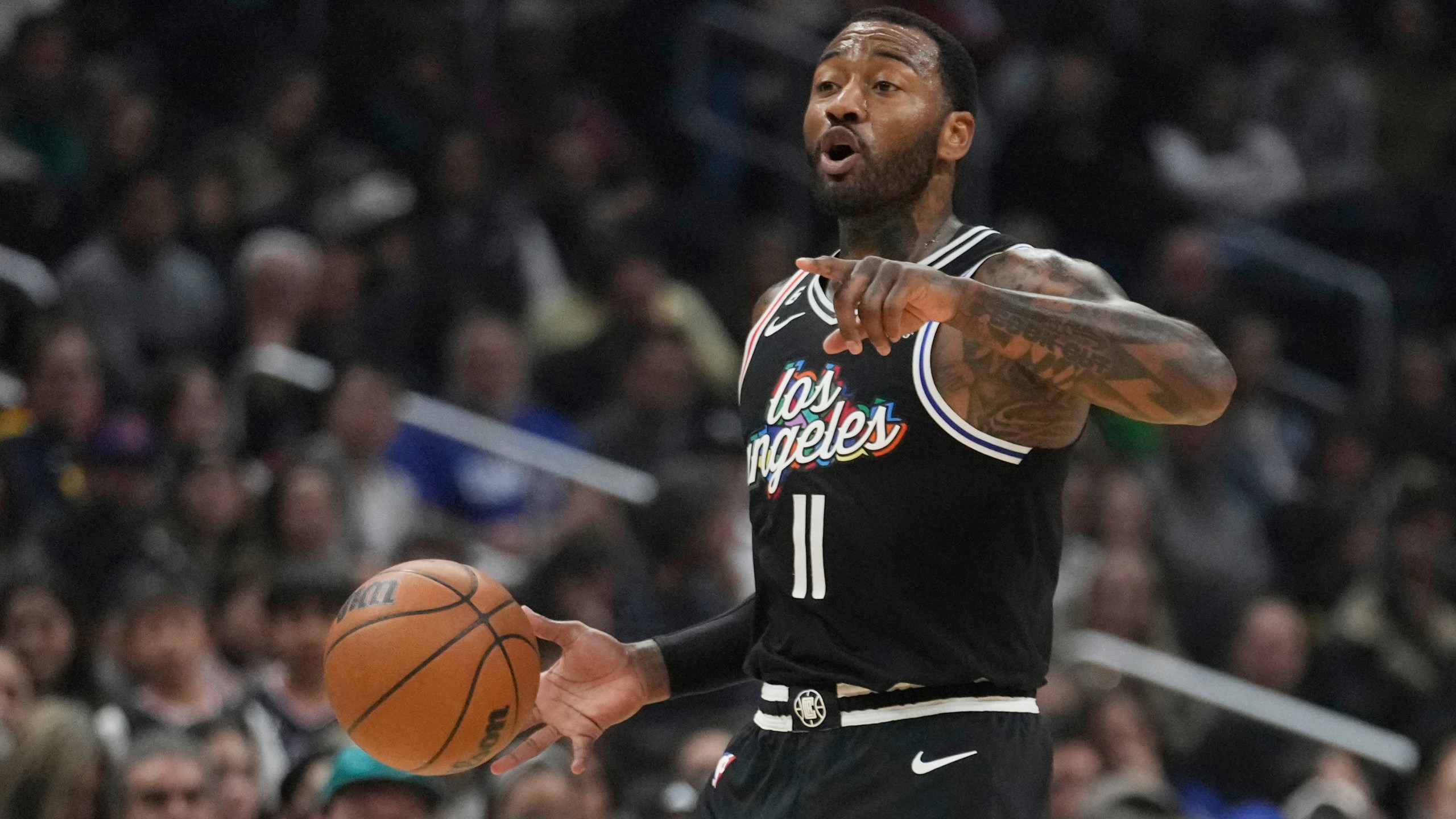 FILE - Los Angeles Clippers guard John Wall dribbles during an NBA basketball game against the Denver Nuggets Friday, Jan. 13, 2023, in Los Angeles. (AP Photo/Marcio Jose Sanchez, File)