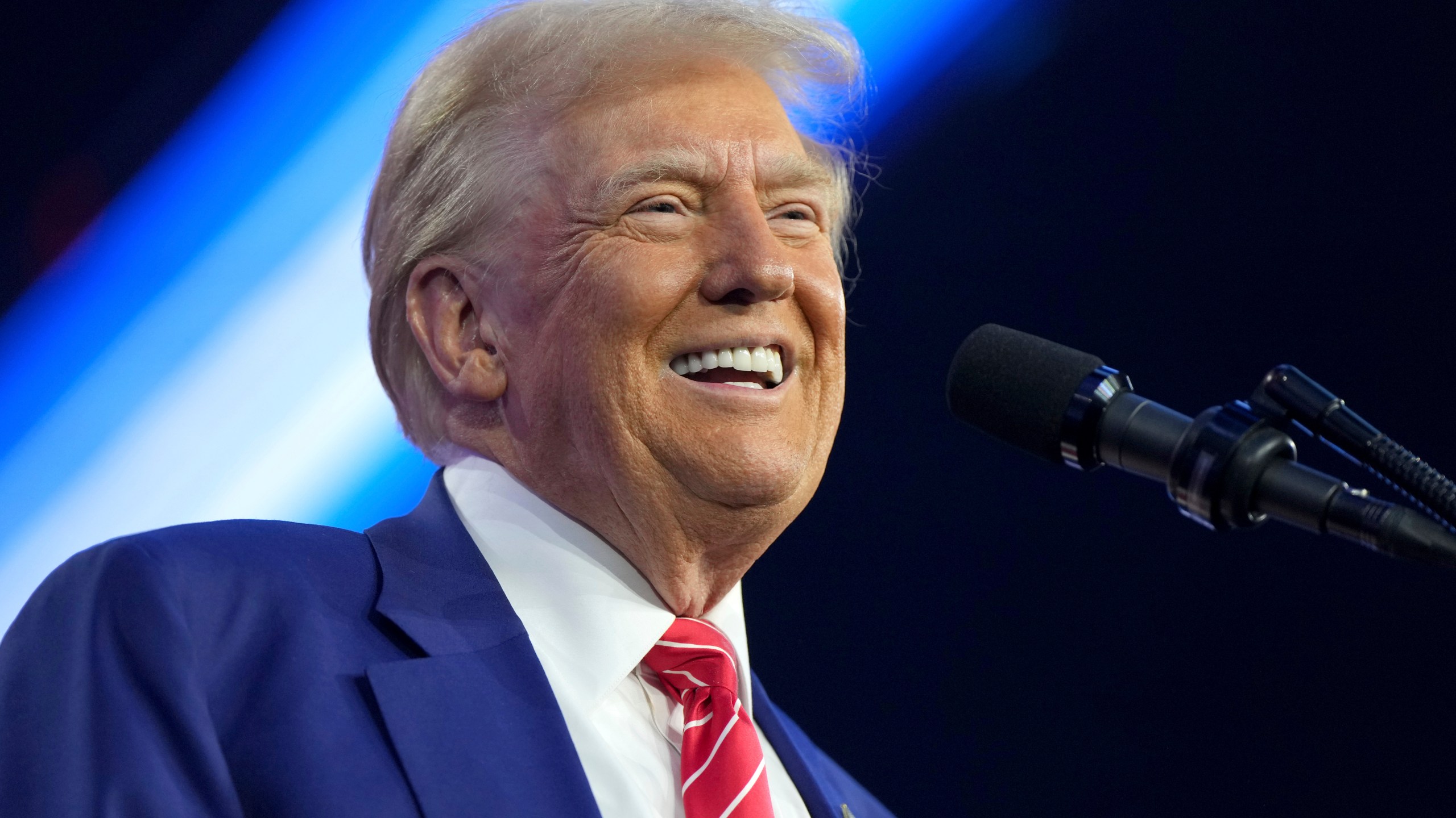 President-elect Donald Trump speaks at AmericaFest, Sunday, Dec. 22, 2024, in Phoenix. (AP Photo/Rick Scuteri)