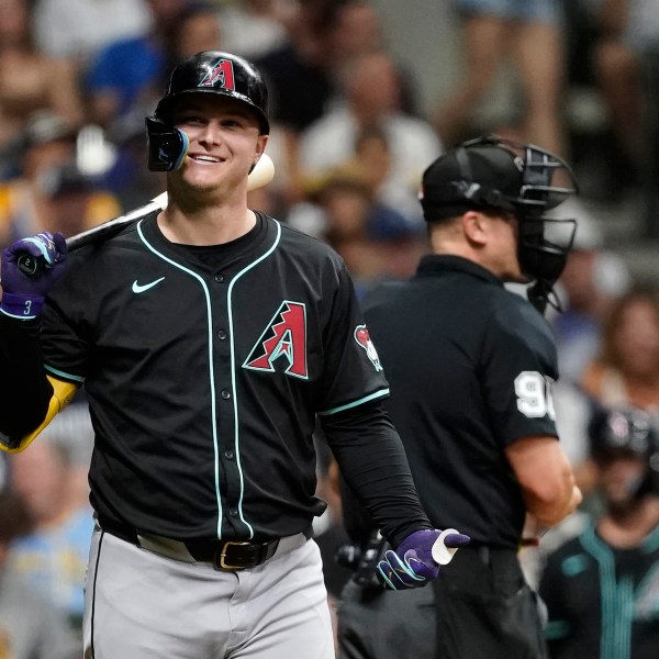 FILE - Arizona Diamondbacks' Joc Pederson smiles while at bat during the third inning of a baseball game against the Milwaukee Brewers, Sept. 21, 2024, in Milwaukee. (AP Photo/Aaron Gash, File)