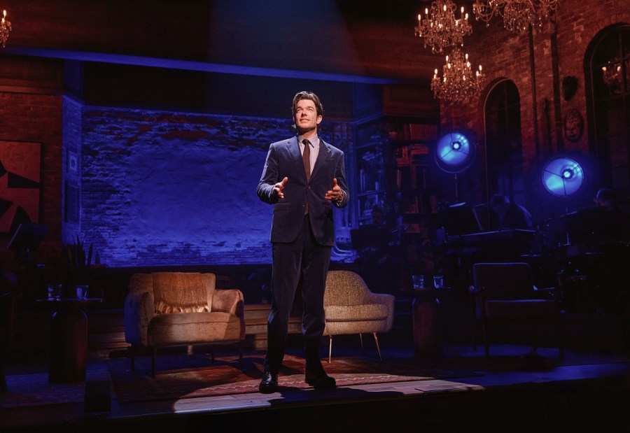 This photo provided by O+M/DKC in December 2024 shows John Mulaney performing in “All In: Comedy About Love” in New York. (Emilio Madrid/O+M/DKC via AP)