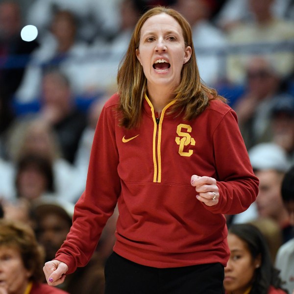 Southern California head coach Lindsay Gottlieb calls to her team in the first half of an NCAA college basketball game against UConn, Saturday, Dec. 21, 2024, in Hartford, Conn. (AP Photo/Jessica Hill)