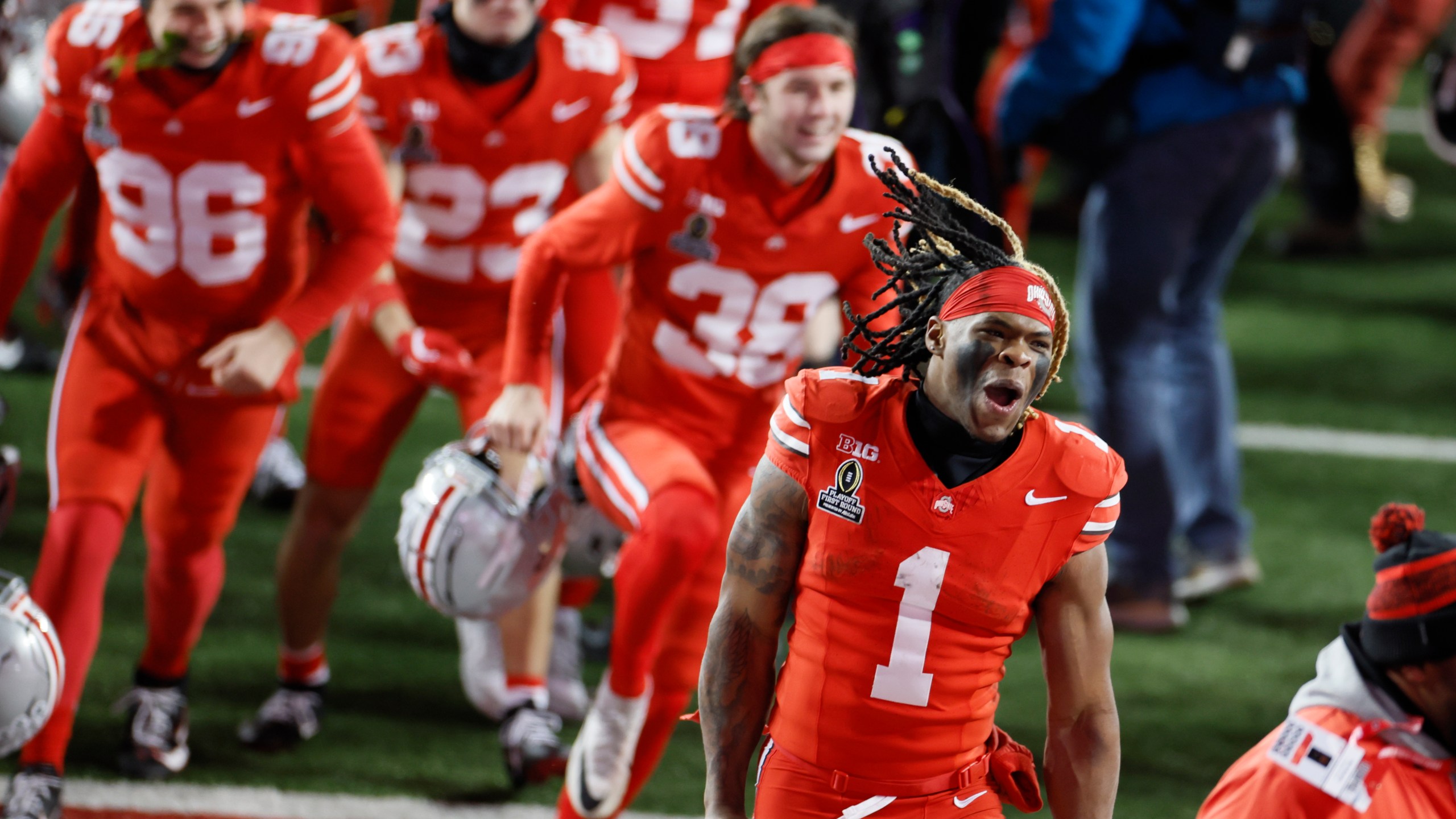 Ohio State running back Quinshon Judkins celebrates the team's win over Tennessee during the first round of the College Football Playoff, Saturday, Dec. 21, 2024, in Columbus, Ohio. (AP Photo/Jay LaPrete)