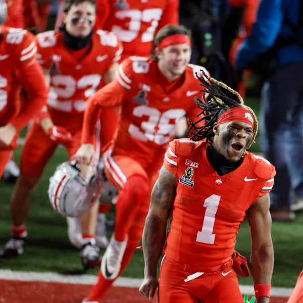 Ohio State running back Quinshon Judkins celebrates the team's win over Tennessee during the first round of the College Football Playoff, Saturday, Dec. 21, 2024, in Columbus, Ohio. (AP Photo/Jay LaPrete)