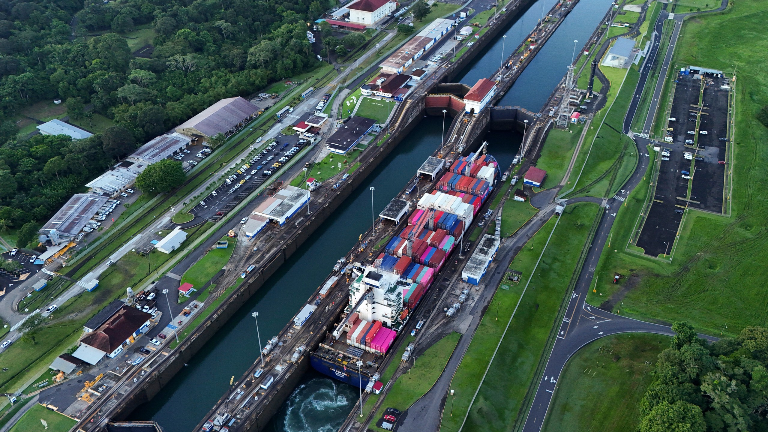 FILE - A cargo ship traverses the Agua Clara Locks of the Panama Canal in Colon, Panama, Sept. 2, 2024. (AP Photo/Matias Delacroix, File)